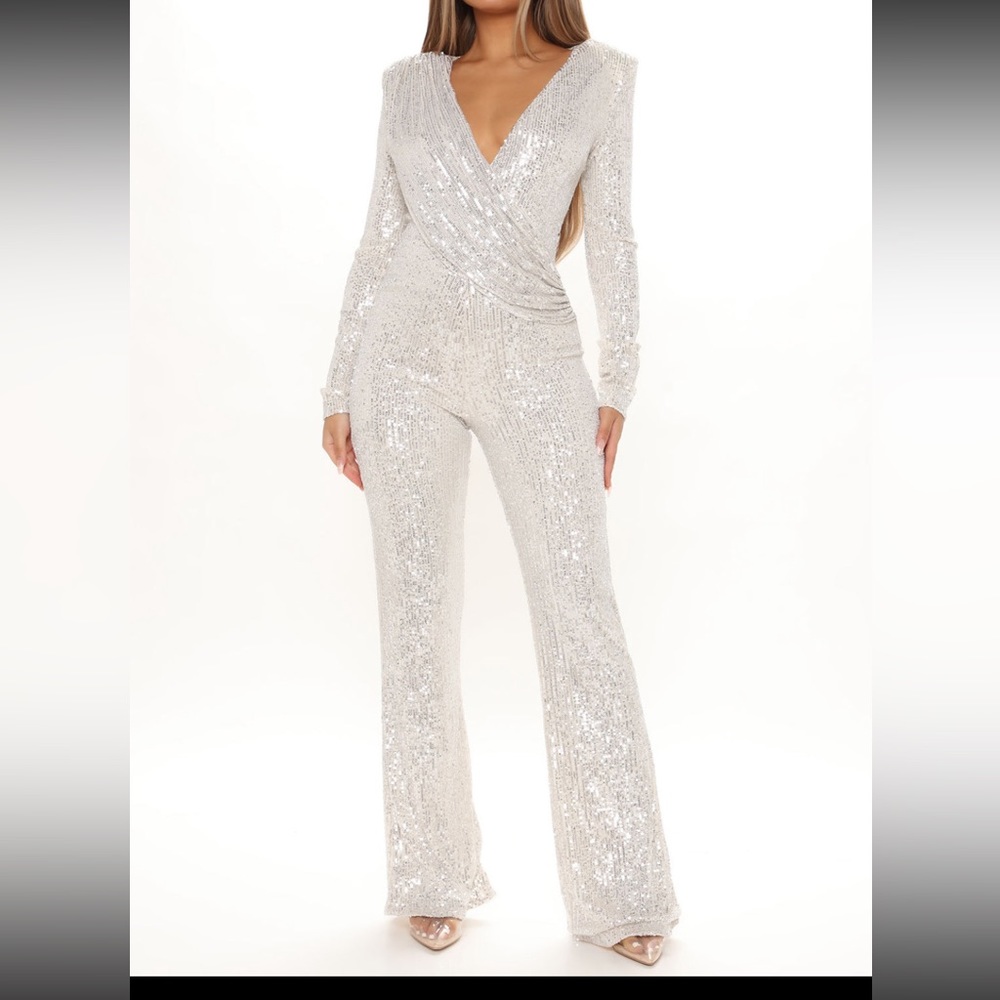 Fashion Nova XS Sequin Jumpsuit.. Silver in color.